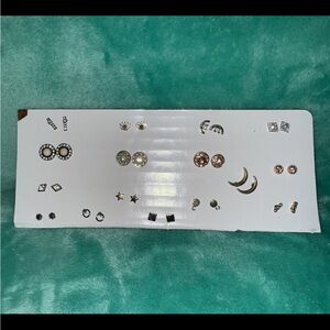 Sixteen Pairs of Gently Used Earrings.